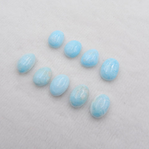 9 cabochons ovales naturels en larimar, 13 x 9 x 4 mm, 14 x 10 x 4 mm, 8,1 g.