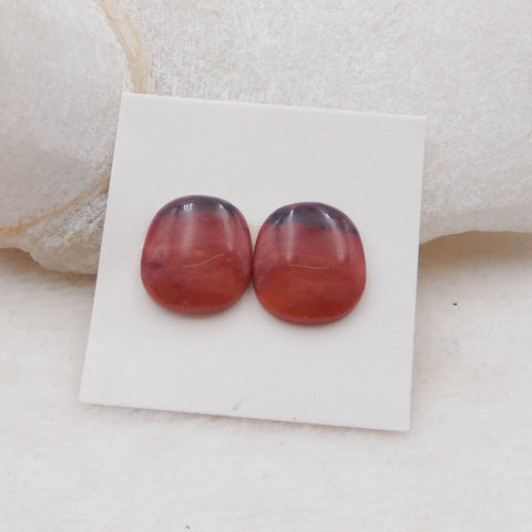 1 paire de cabochons en jaspe rouge naturel 15 x 13 x 4 mm, 2,7 g.