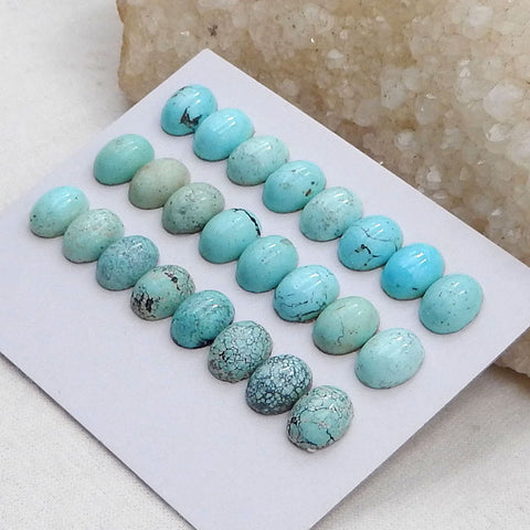 24 cabochons ovales bleu turquoise naturel, 9 x 7 x 4 mm, 7,9 g.