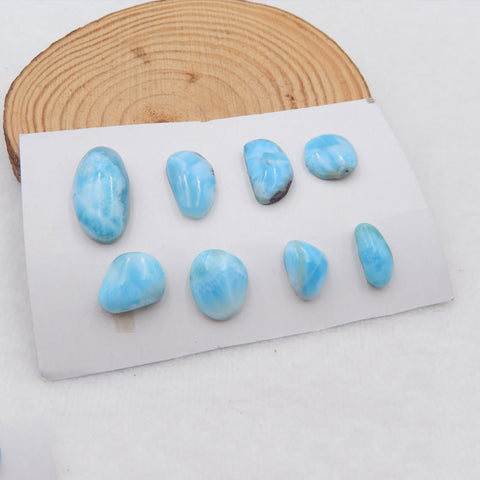 8 cabochons Freedom Larimar, 27 x 13 x 8 mm, 16 x 8 x 5 mm, 12,8 g.