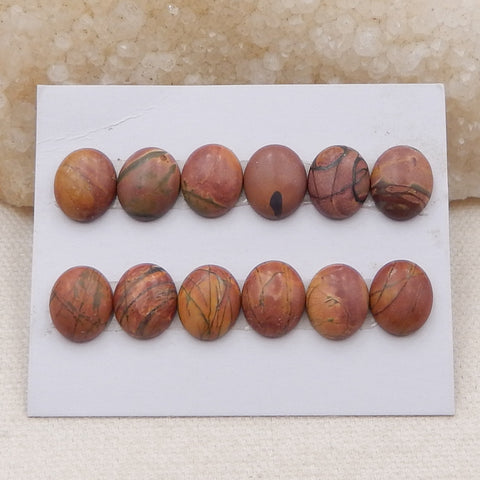 12 cabochons ovales à dos plat en jaspe rouge, 12 x 9 x 4 mm, 8,8 g.