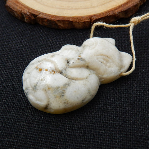 Carved Indonesian Fossil Coral fox Pendant, 36x22x9mm, 9g - MyGemGarden