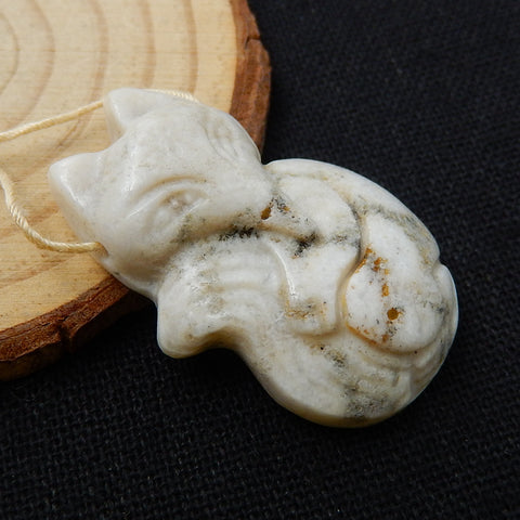 Carved Indonesian Fossil Coral fox Pendant, 36x22x9mm, 9g - MyGemGarden